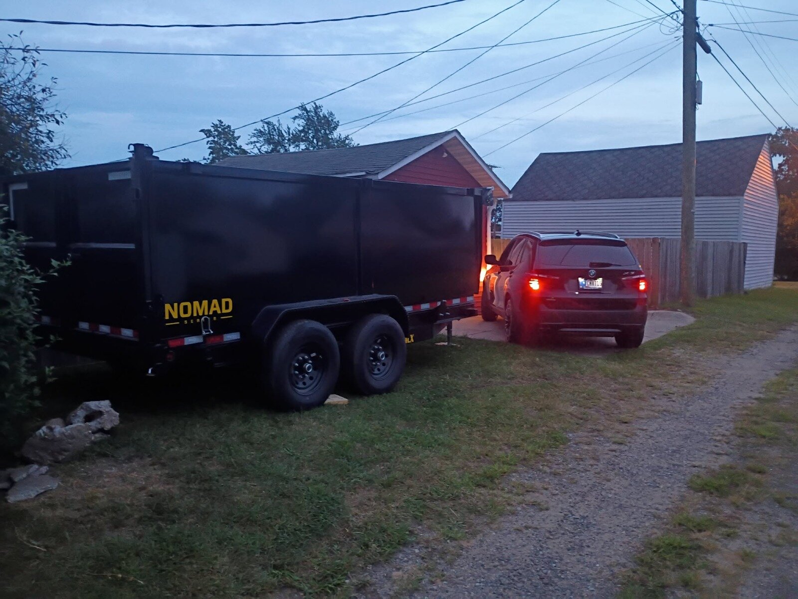 Big Willie dump trailer positioned in a South Bend driveway